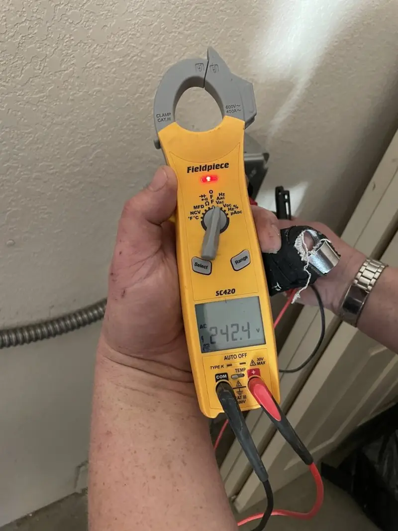 Voltage testing with clamp meter during Generator Installation in Fairbury